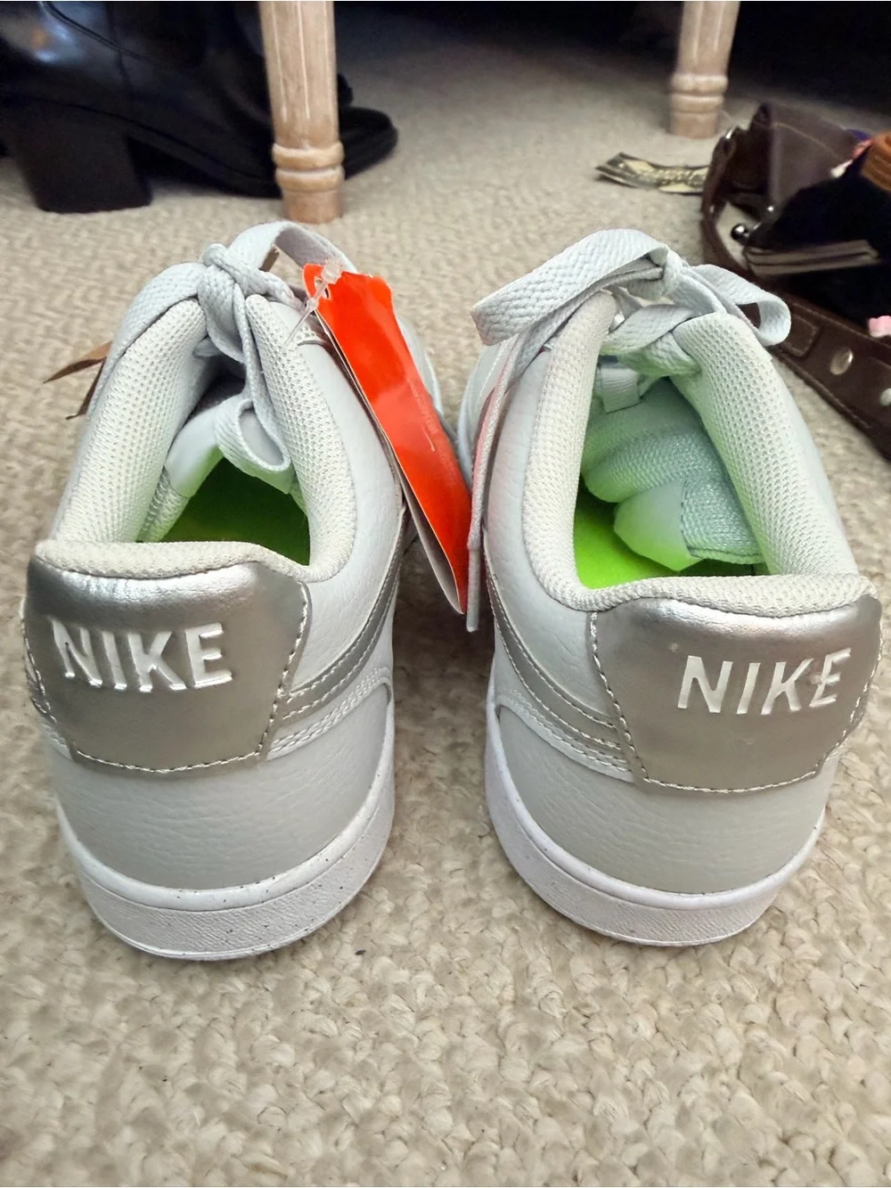 Nike Women’s White Low-Top Sneakers with Neon Green Insole Accent